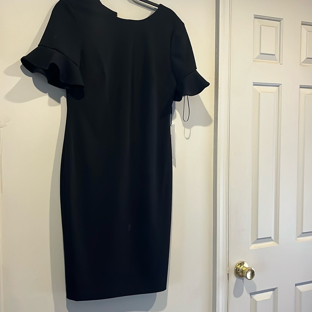 New with tags, black, mid length Calvin Klein dress